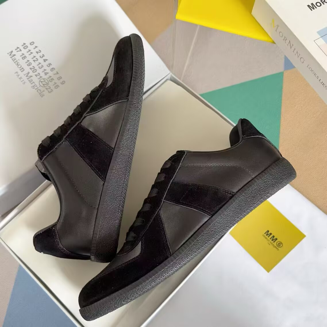 ua ma*s*n Ma*i*la mm6 sneakers