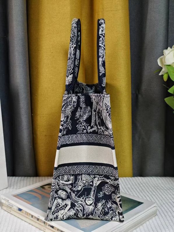 large D*or book tote blue and ecru toile de jouy reverse embroidery 16.5 x 14 x 7.5 inches