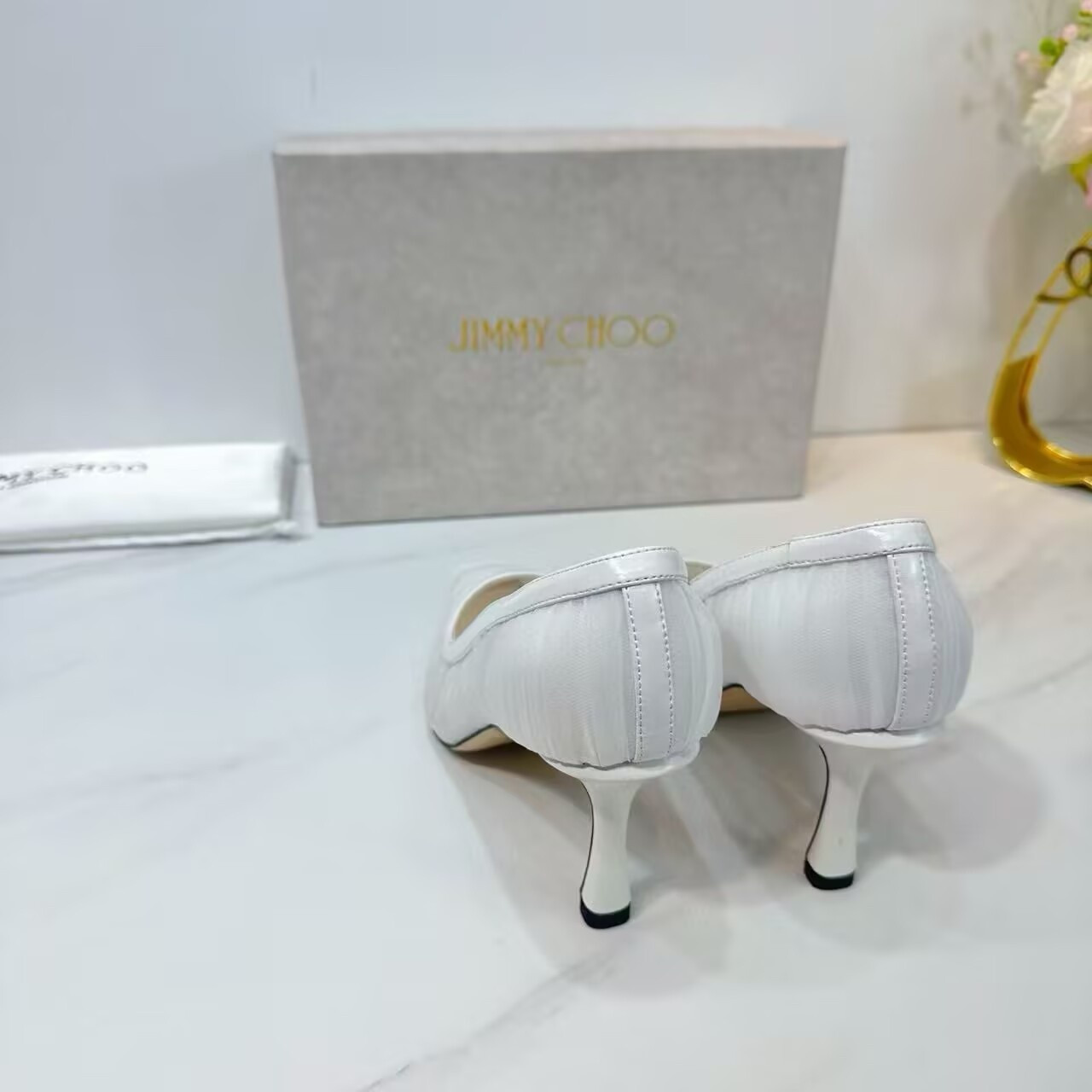 ua Ji*y Ch* ivory tulle and nappa pumps