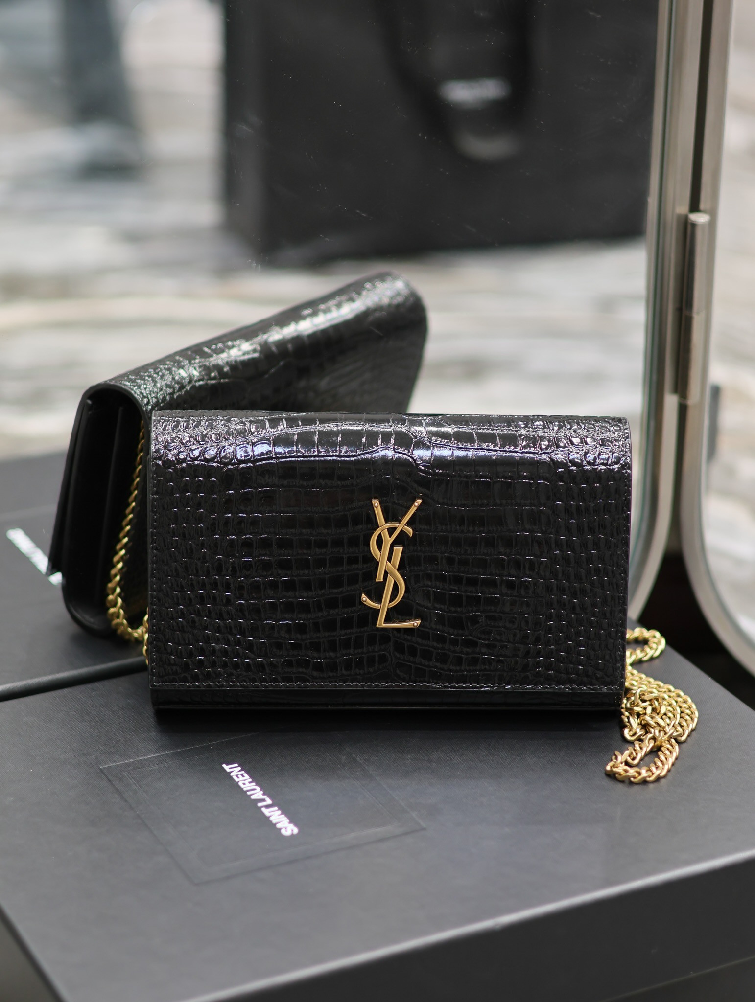 Y*L cassandre chain wallet in crocodile-embossed shiny leather