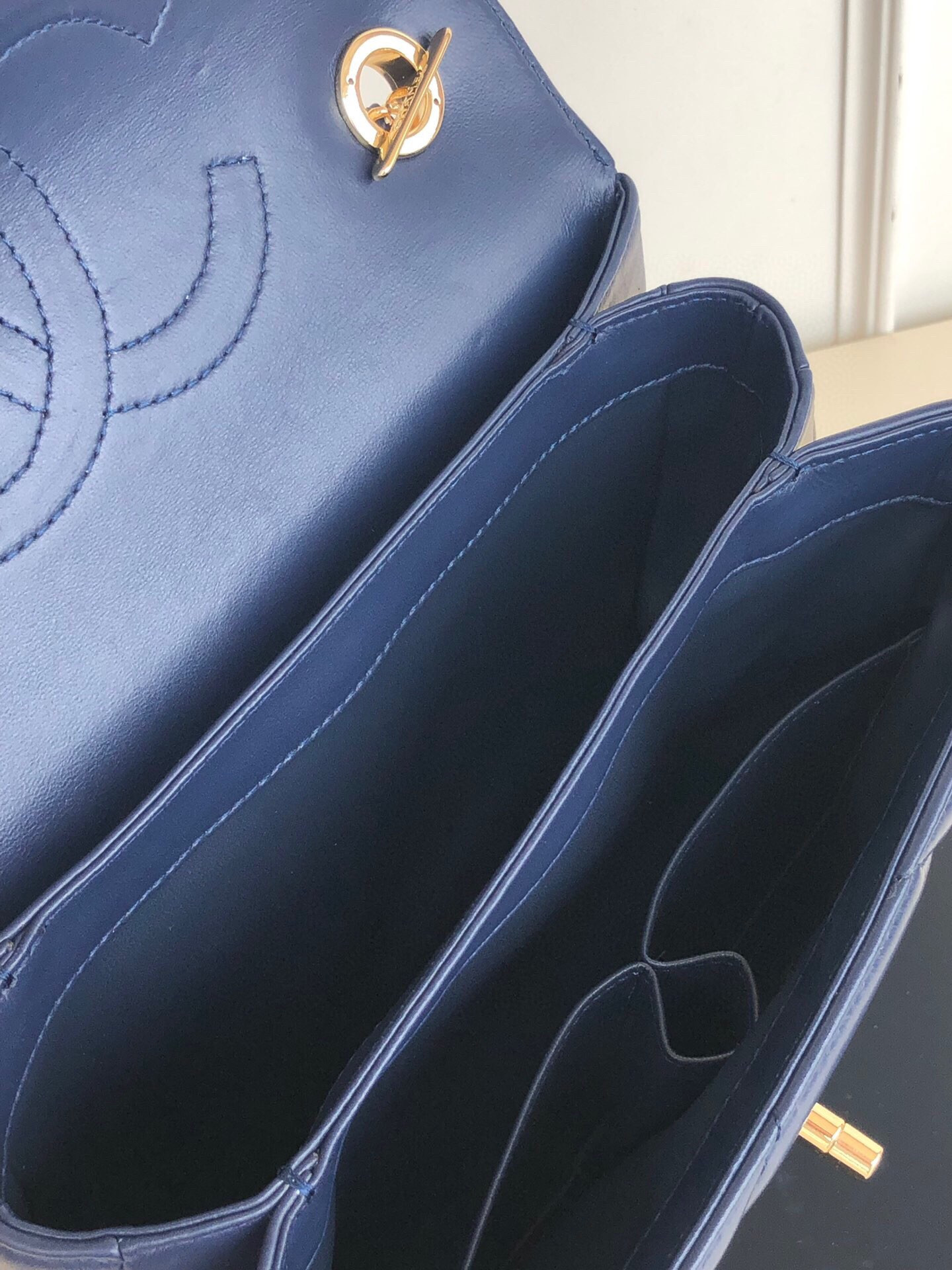 Ch*el flap bag with top handle 6.6 × 9.8 × 4.7 in