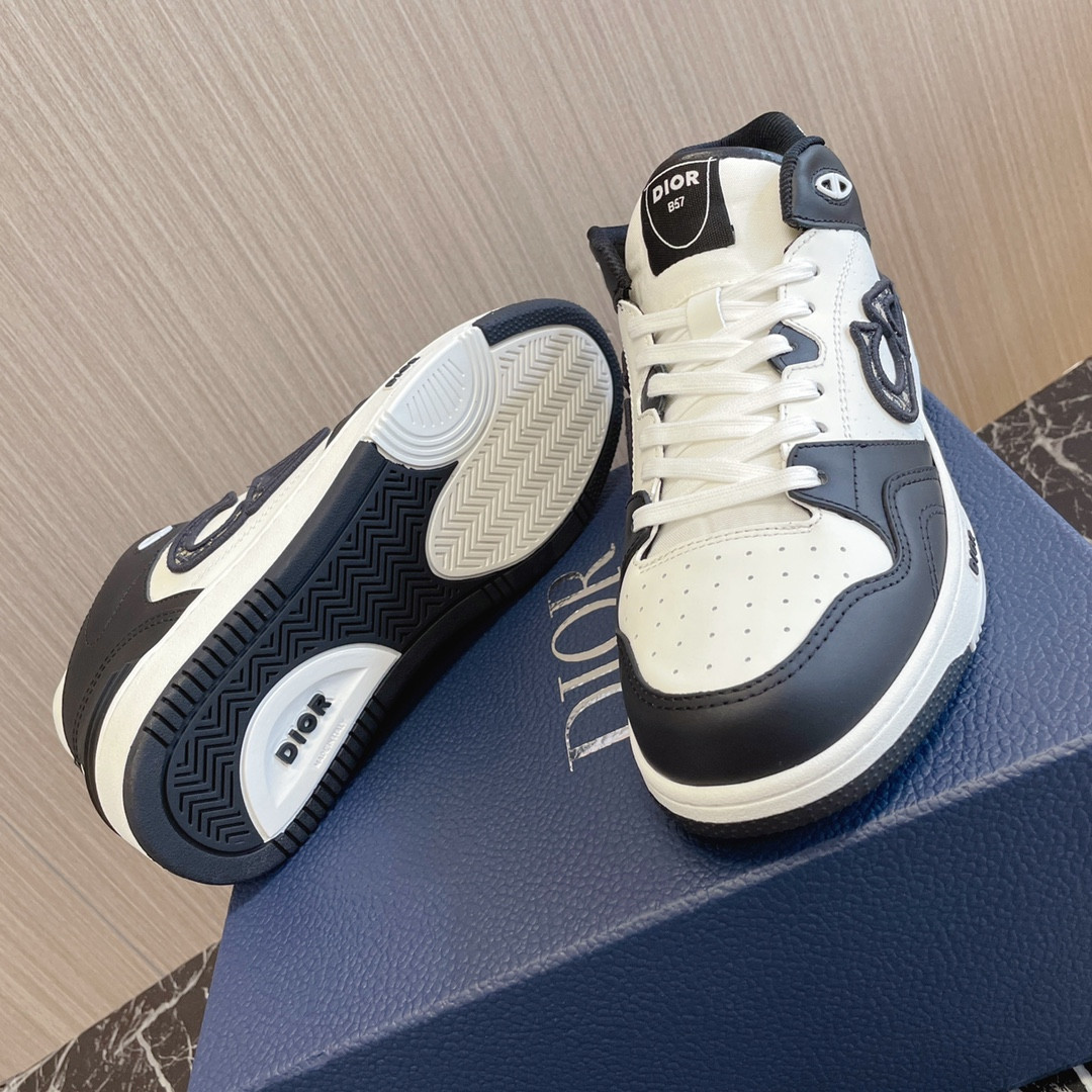 ua D*or b57 mid-top sneaker black and white