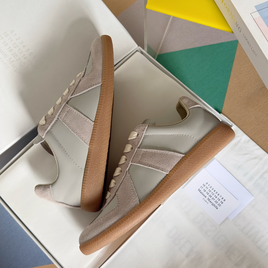 ua ma*s*n Ma*i*la mm6 sneakers