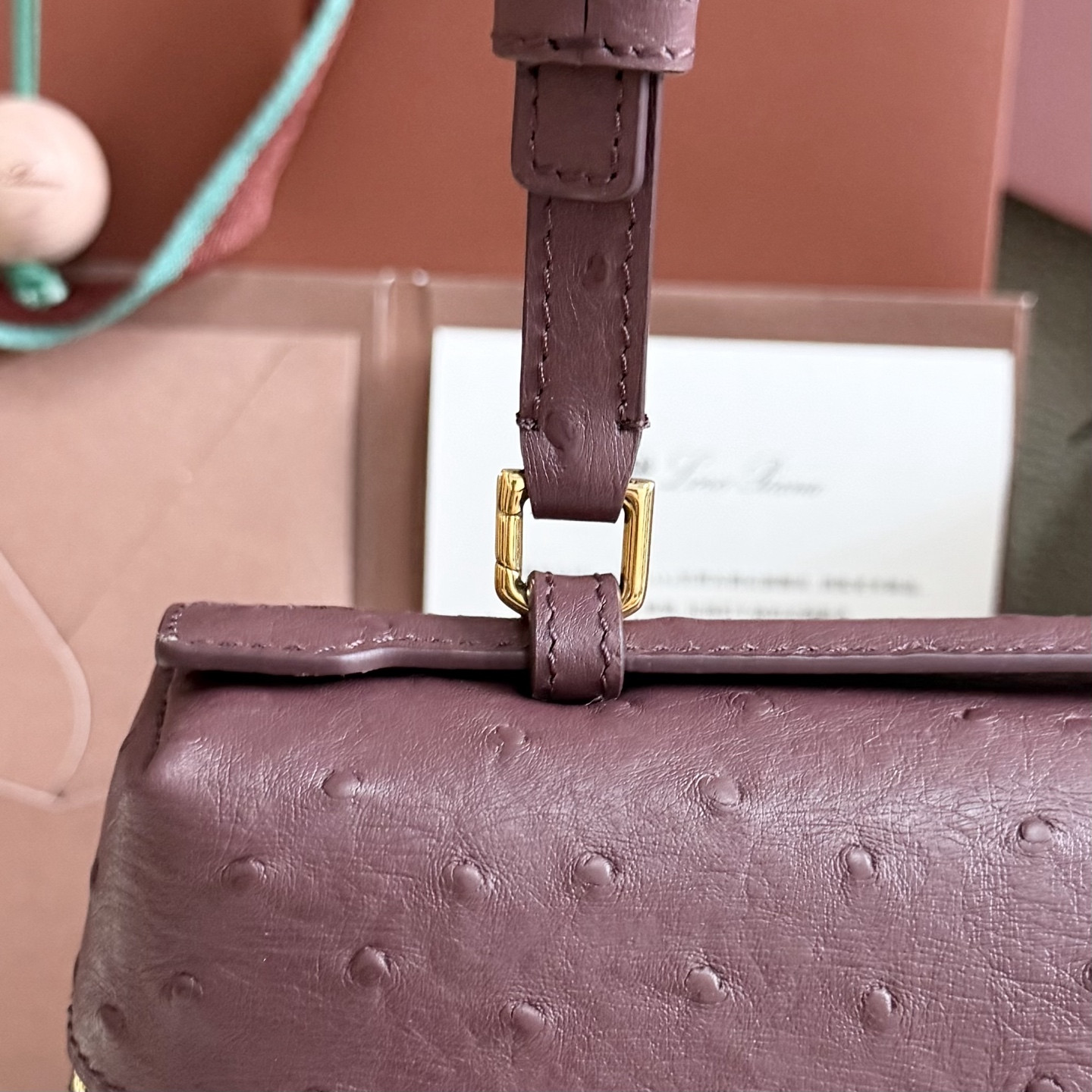 L**o p*ana extra pocket l27 ostrich-grained leather 16x27x10cm